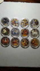 Памятні монети дванадцять сузір'їв зодіака